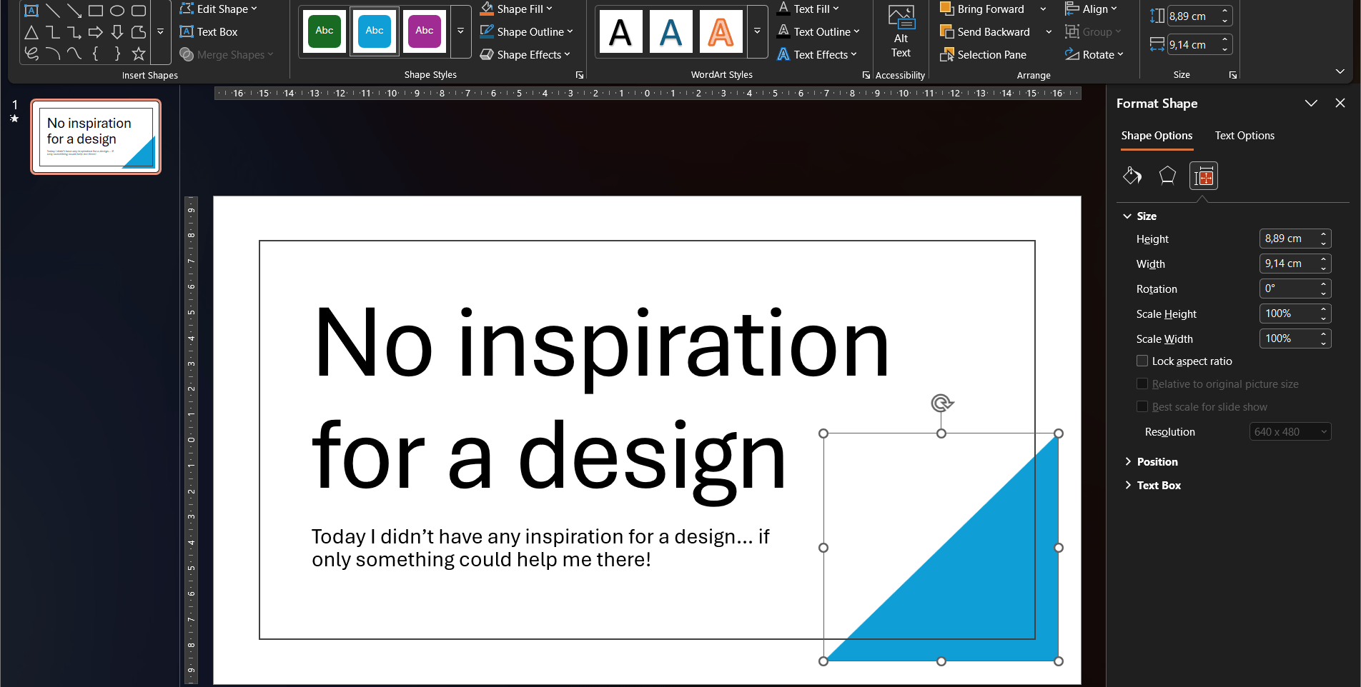 The triangle shape now showing full resize and move handles after unlocking